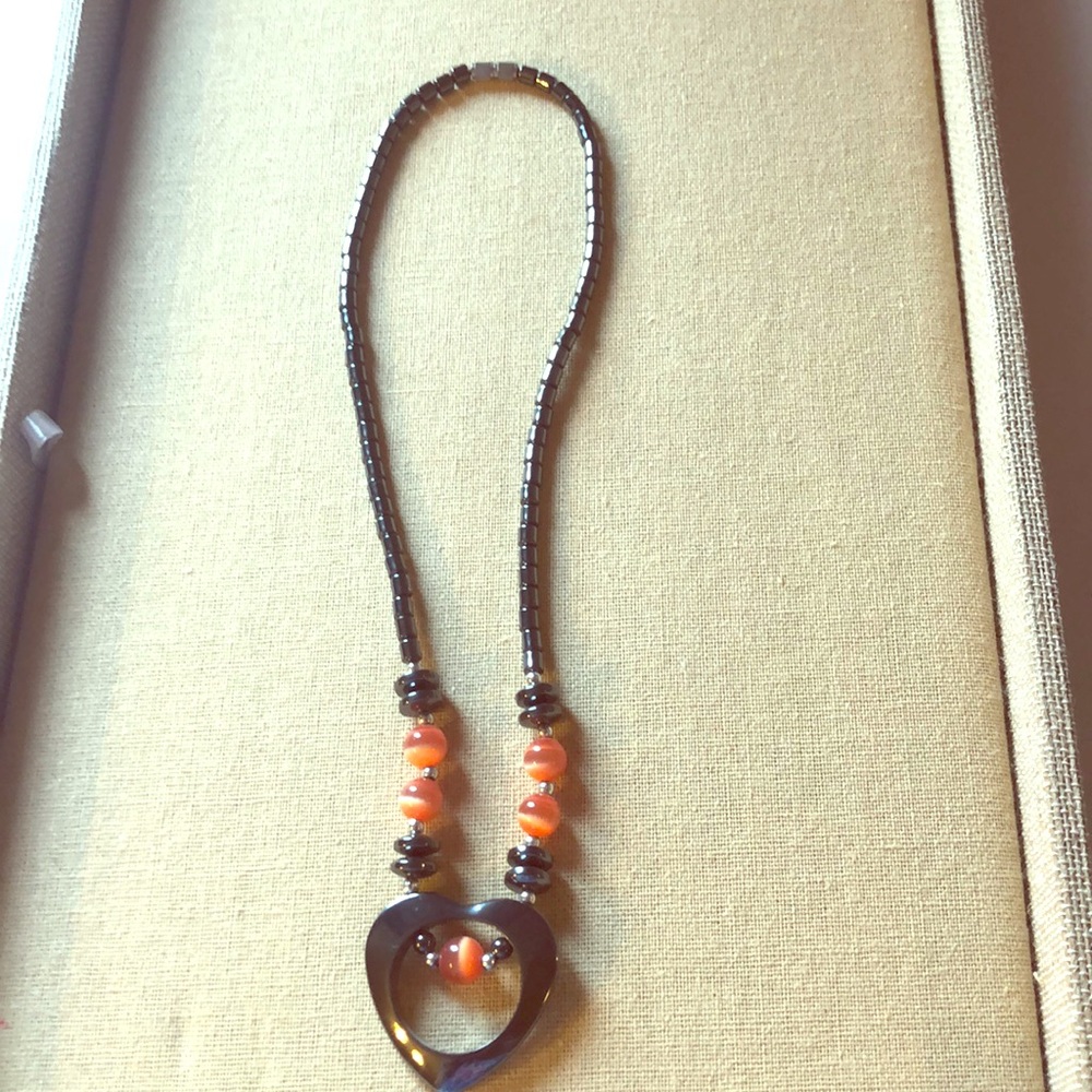 Beautiful peach and gray metal necklace